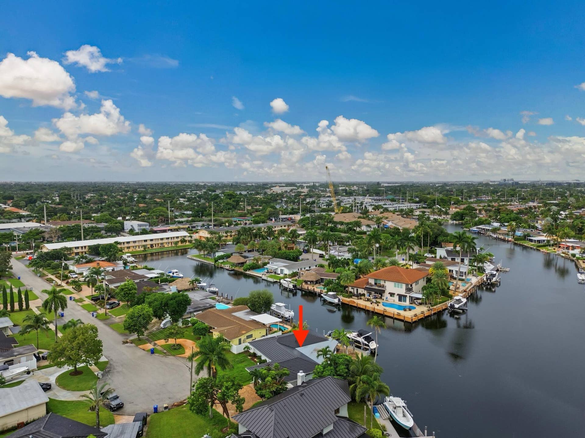 1311 SE 4TH Avenue, Pompano Beach, Pompano Beach, FL 33060 Waterfront property featuring direct canal access, an established neighborhood setting, mature trees, and a private boat dock