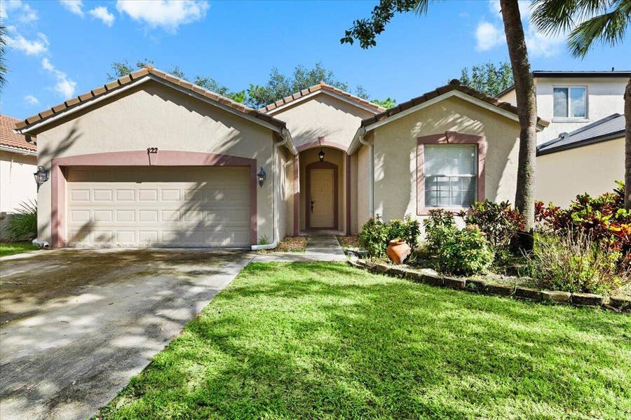 Property photo for 122 Seminole Lakes Drive, Royal Palm Beach, FL