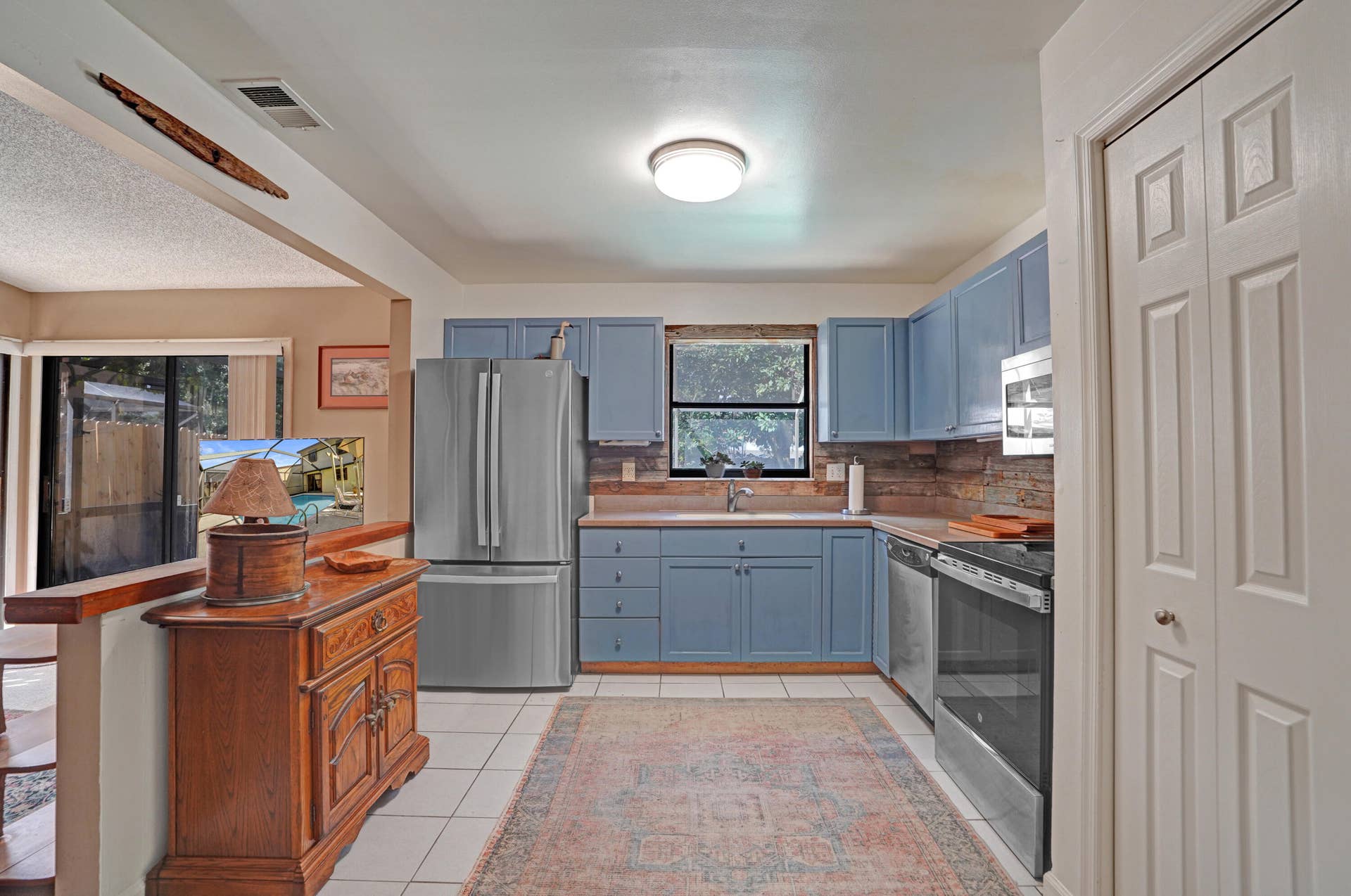 View of the huge kitchen open to vaulted family room.
