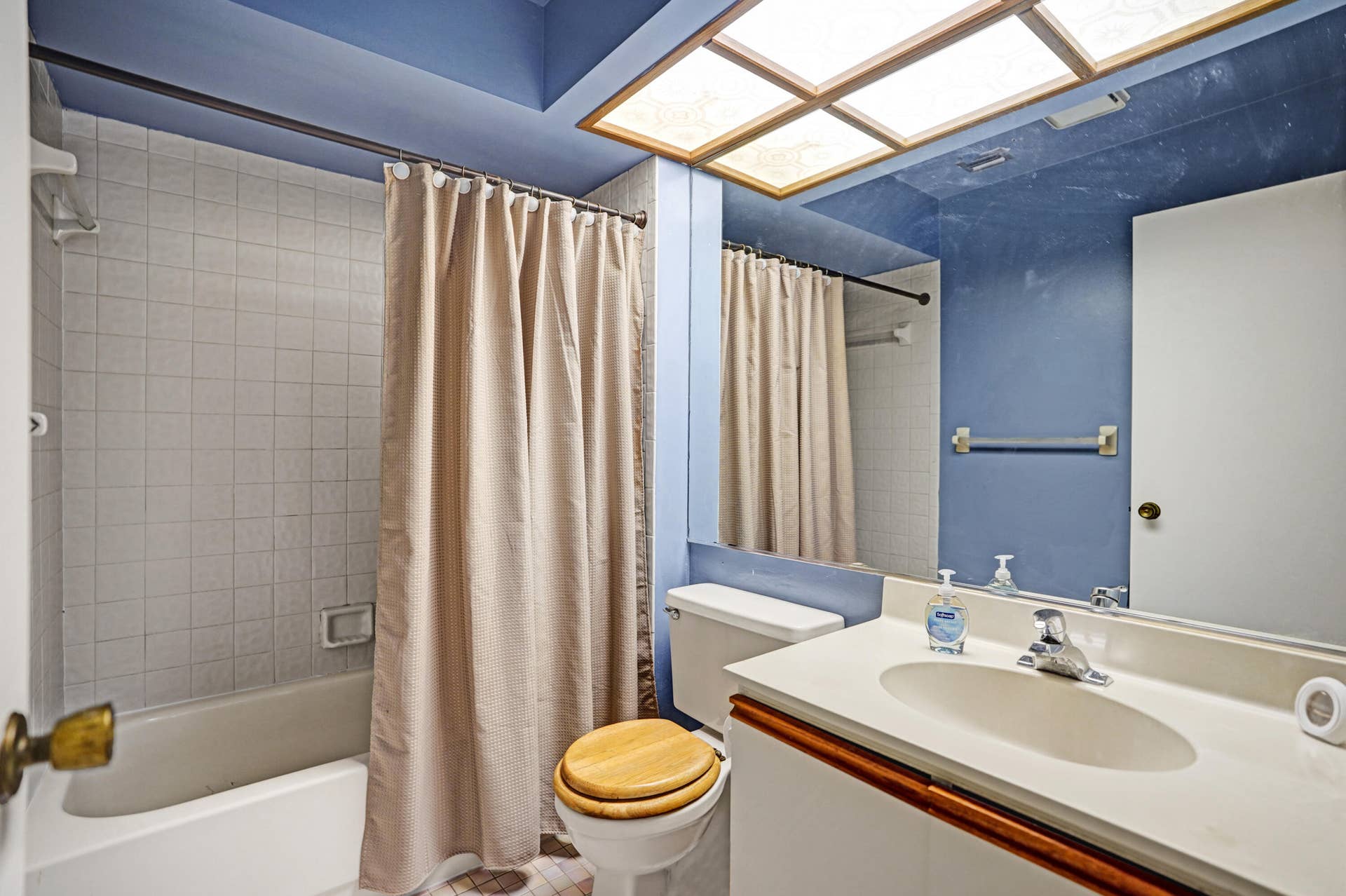 View of 2nd full bath with tub.