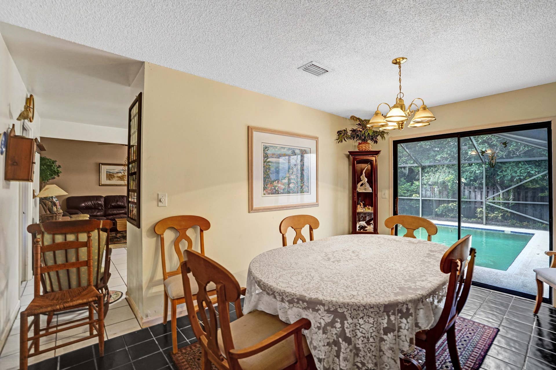 Entertain in the large dining room with private views of pool area.