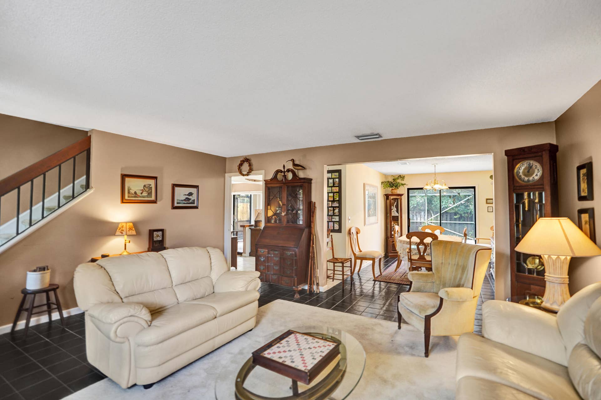 View of living room open to dining room.