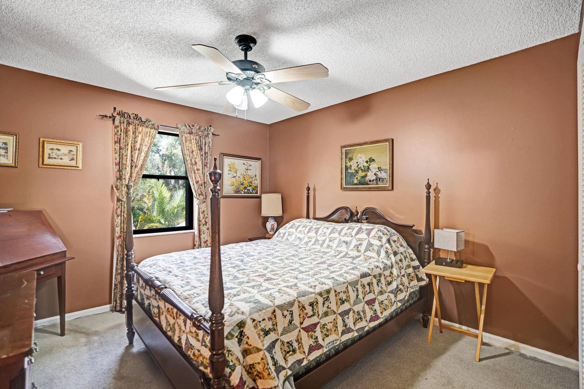 View of 2nd bedroom with ceiling fan.