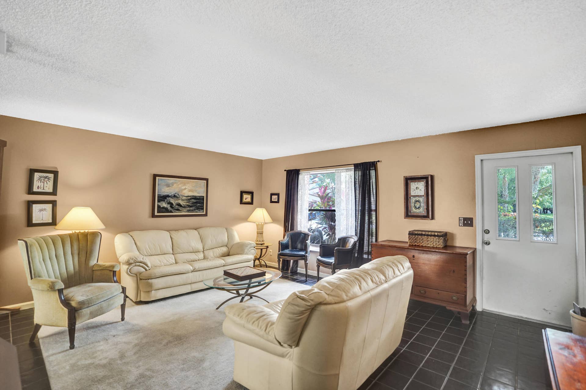 Another view of the living room and front entry.