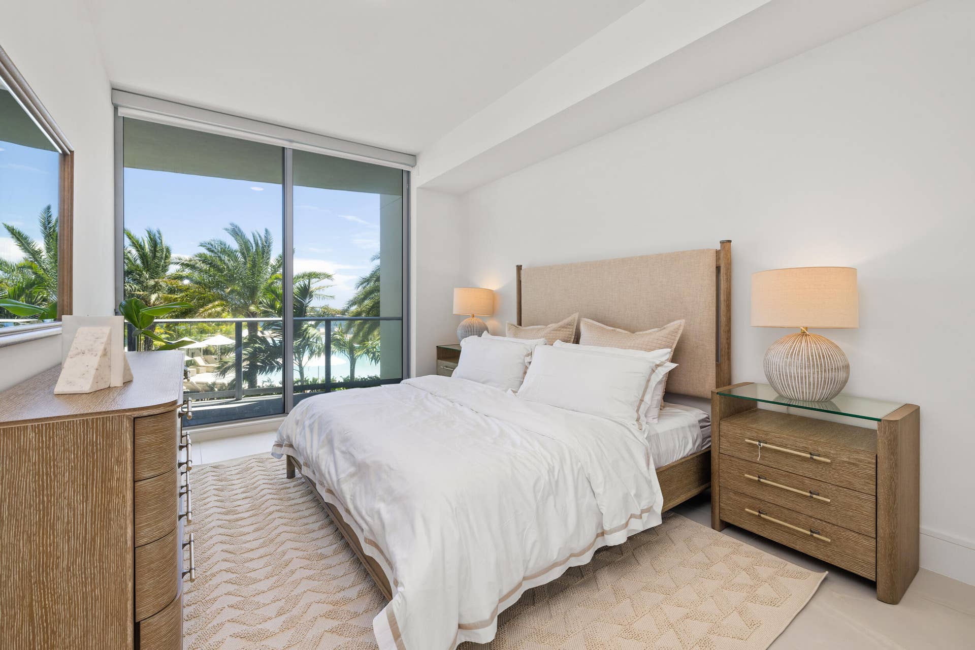 220 Lake Shore Drive, #704, Lake Park, FL 33403 Floor-to-ceiling sliding glass doors, white walls, and a recessed ceiling