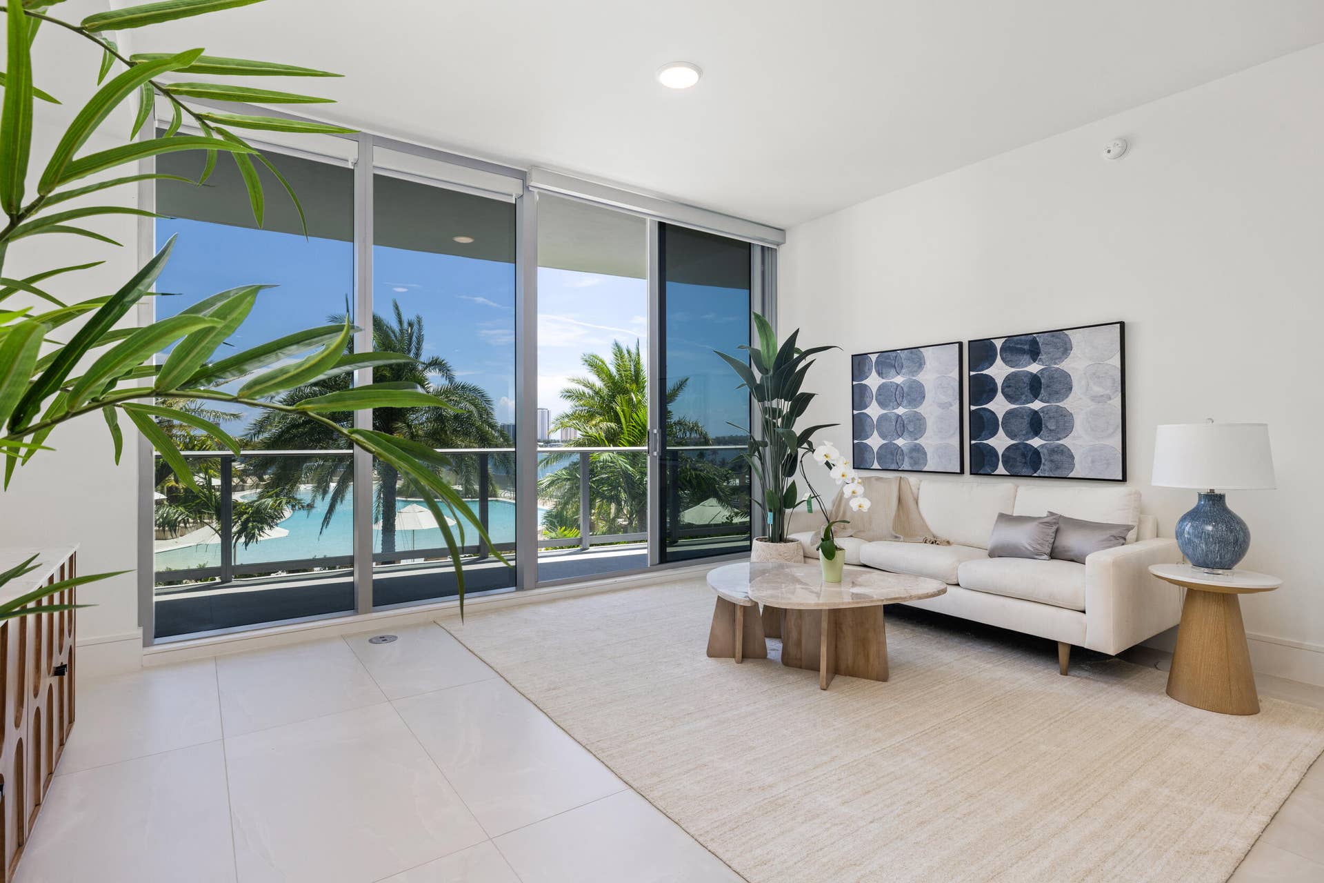 220 Lake Shore Drive, #704, Lake Park, FL 33403 Floor-to-ceiling glass doors with roller shades