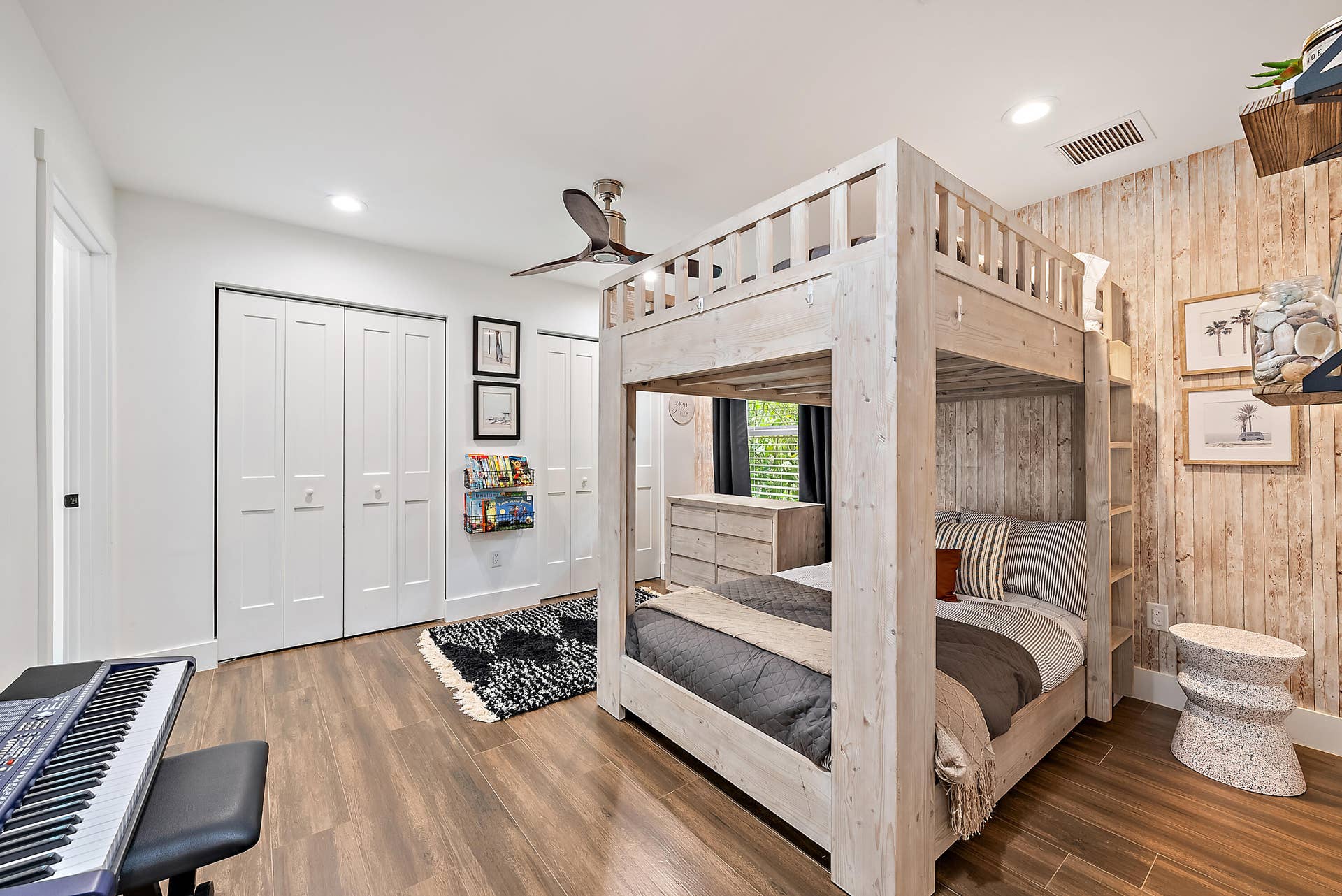 6204 SAND PINE Court, Jupiter, Jupiter, FL 33458 Room featuring wood-finish flooring, white walls, and a ceiling fan