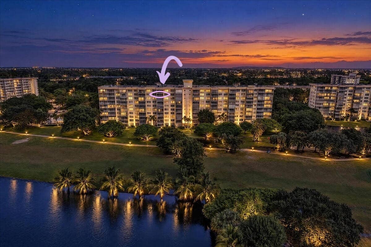 3520 Oaks Way, #904, Pompano Beach, FL 33069 Unit twilight back of building