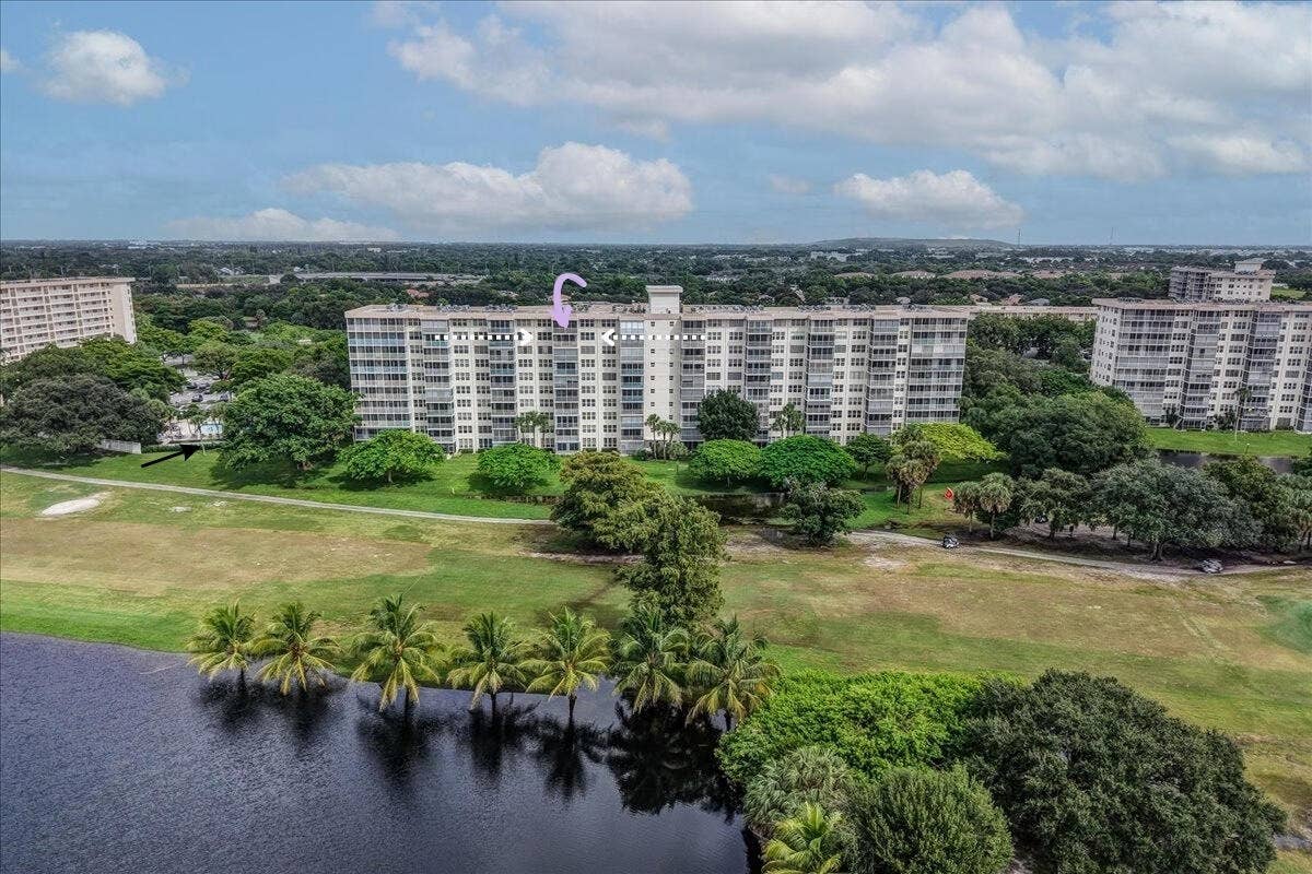 3520 Oaks Way, #904, Pompano Beach, FL 33069 Back of the building with unit and