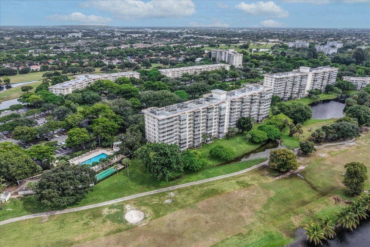 3520 Oaks Way, #904, Pompano Beach, FL 33069 Pool is directly next door to this Building!