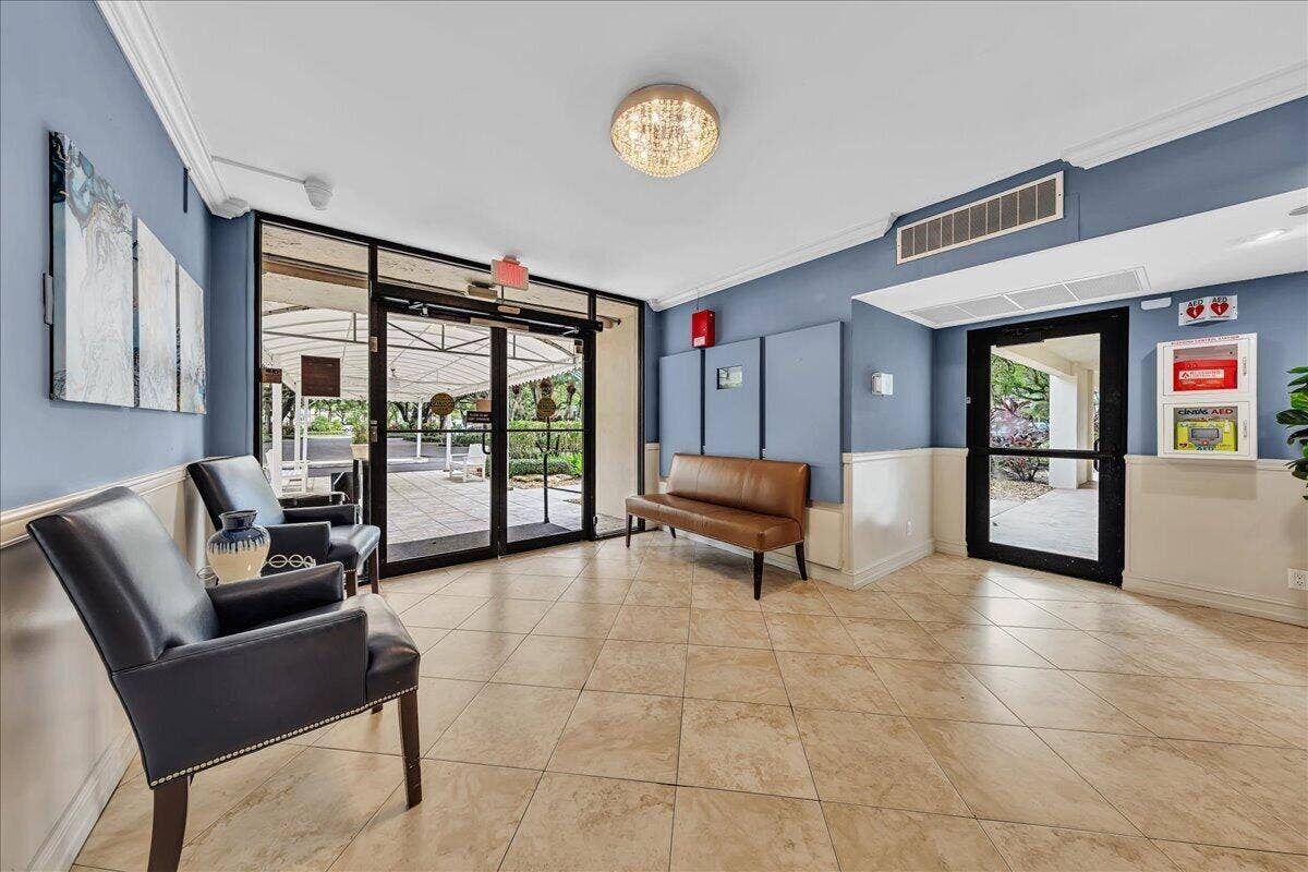 3520 Oaks Way, #904, Pompano Beach, FL 33069 Notice Life Saving AED equipment on the wall