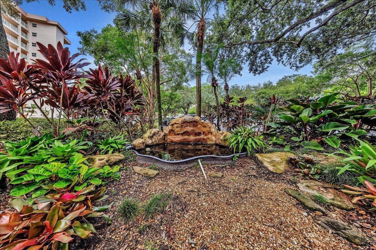 3520 Oaks Way, #904, Pompano Beach, FL 33069 Zen fountain that greets you as you