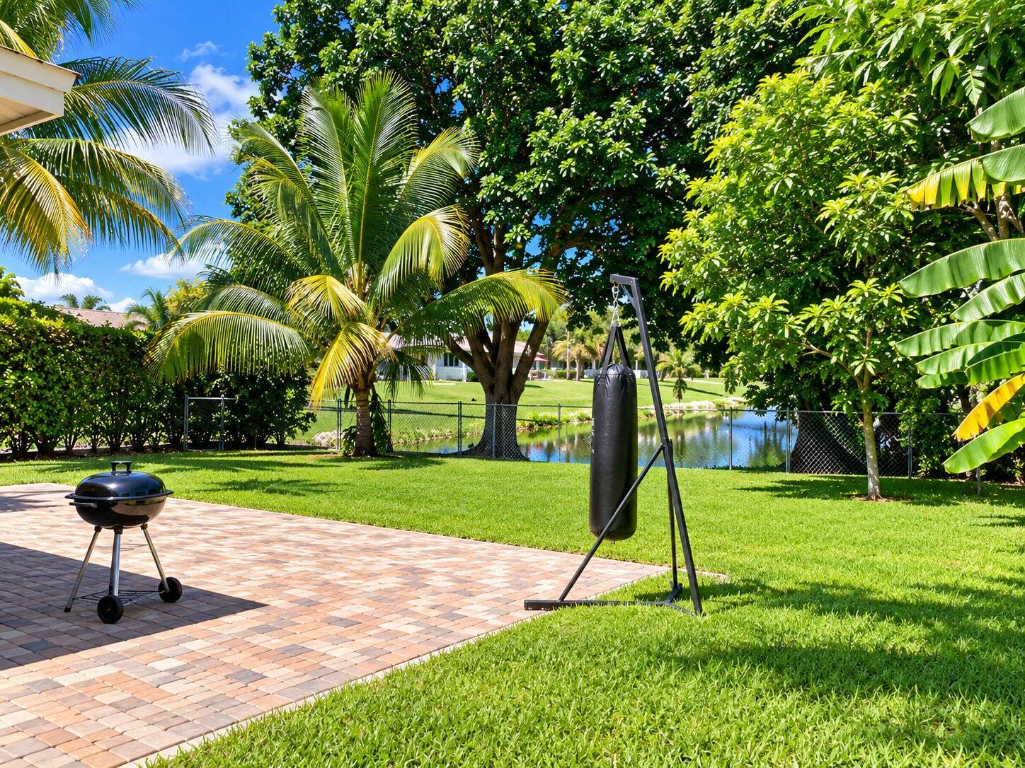 19660 DELAWARE Circle, #0, Boca Raton, FL 33434 Tropical Backyard Retreat by the Pond