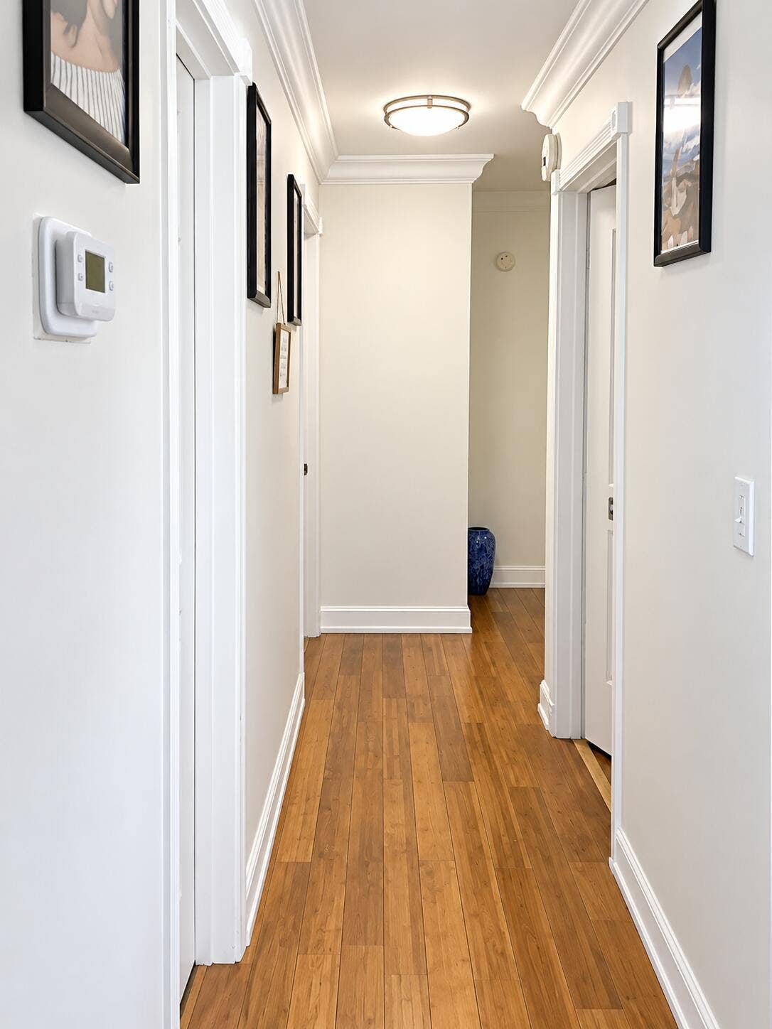 19660 DELAWARE Circle, #0, Boca Raton, FL 33434 Bright Modern Hallway with Blue Vase