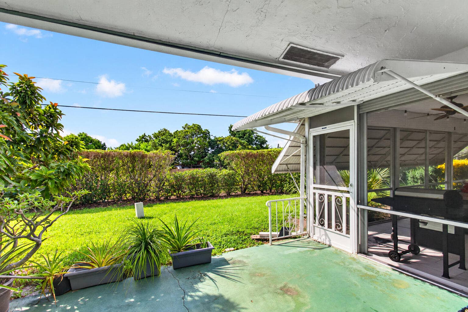 812 Meadowlark Lane, Delray Beach, FL 33445 17_rear_patio_clean_alt