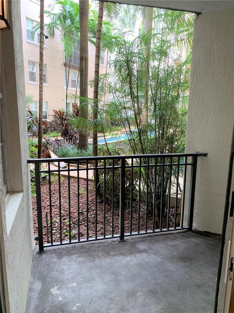 533 NE 3RD Avenue, #115, Fort Lauderdale, Fort Lauderdale, FL 33301 Private balcony featuring concrete flooring and a black metal railing