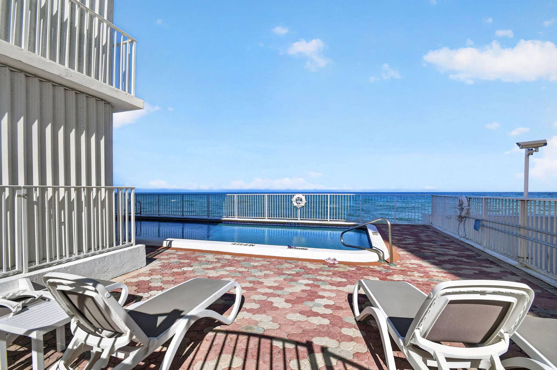 3580 S Ocean Boulevard, #4-F, South Palm Beach, FL 33480 Lounge Chairs by the Pool