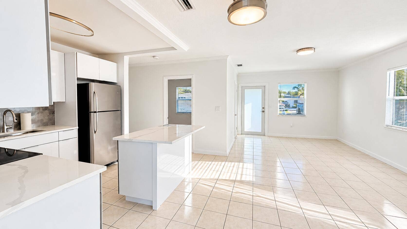 835 FERNWOOD Drive, West Palm Beach, West Palm Beach, FL 33405 Sunlit Modern Open-Plan Kitchen Interior