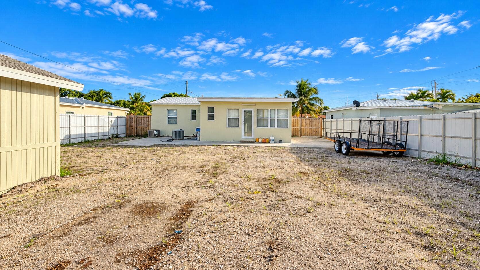 835 FERNWOOD Drive, West Palm Beach, West Palm Beach, FL 33405 Sunny Backyard with Trailer and House