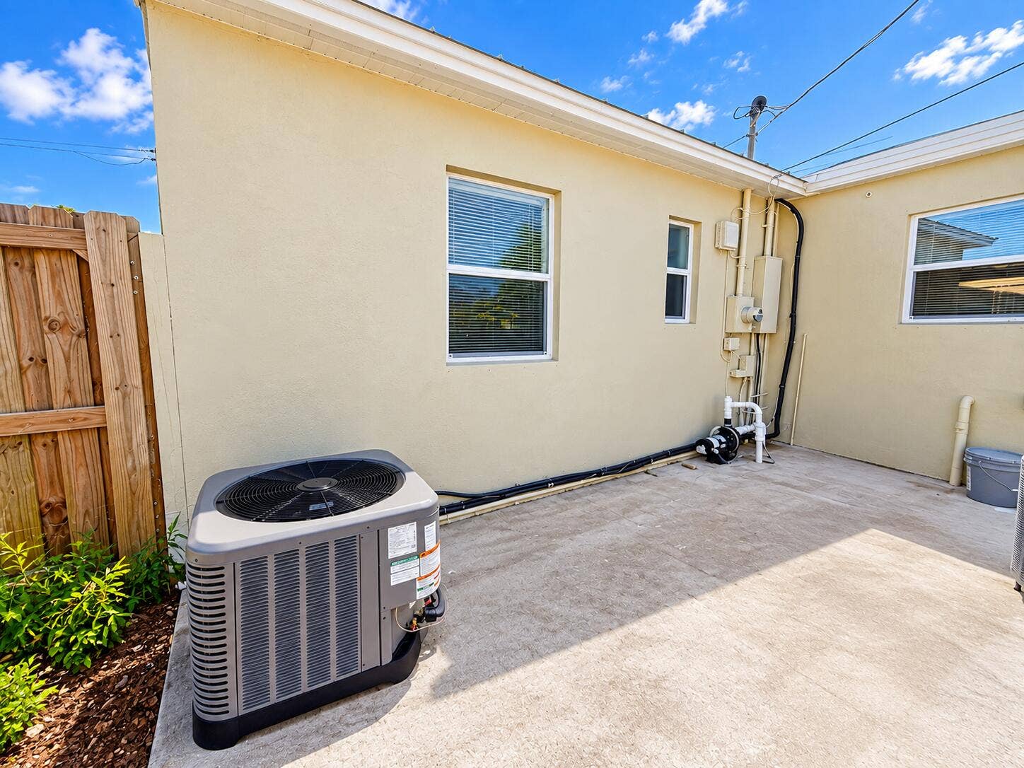 835 FERNWOOD Drive, West Palm Beach, West Palm Beach, FL 33405 Sunny Backyard Home Exterior with HVAC U