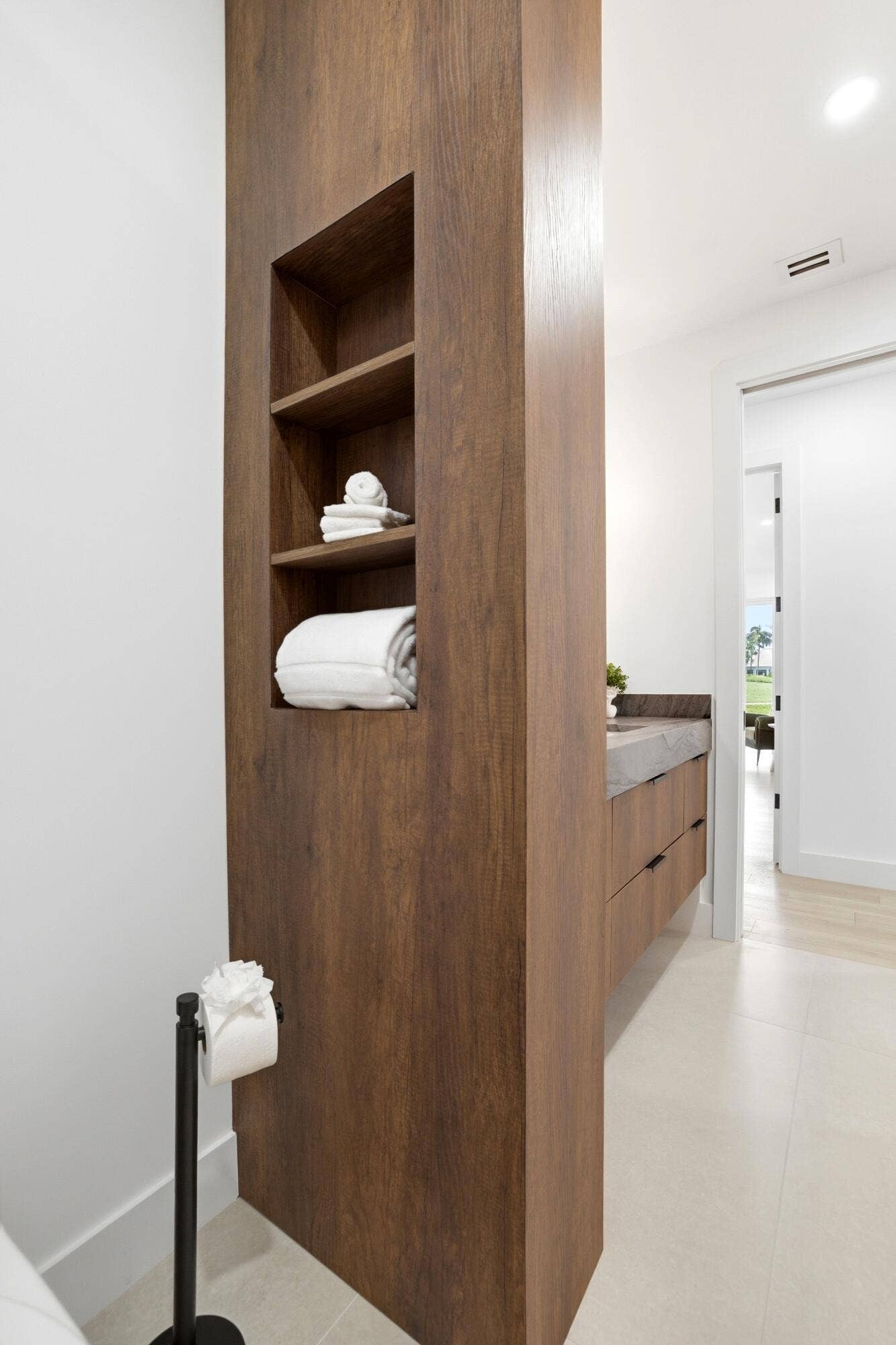 Hidden storage in custom privacy wall