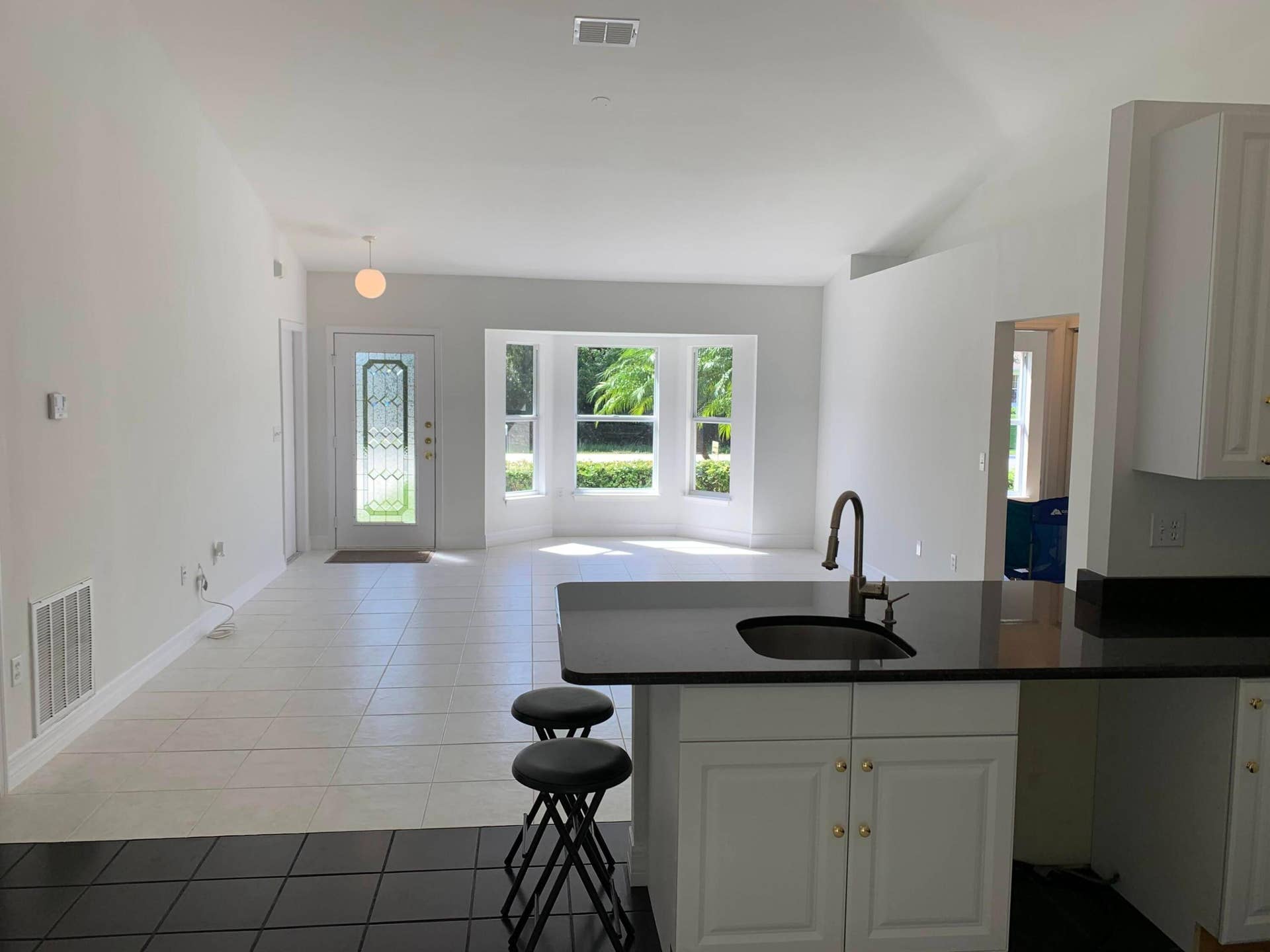 5570 NW CRUZAN Avenue, Port St Lucie, FL 34986 CRUZAN KITCHEN TO LIVING ROOM