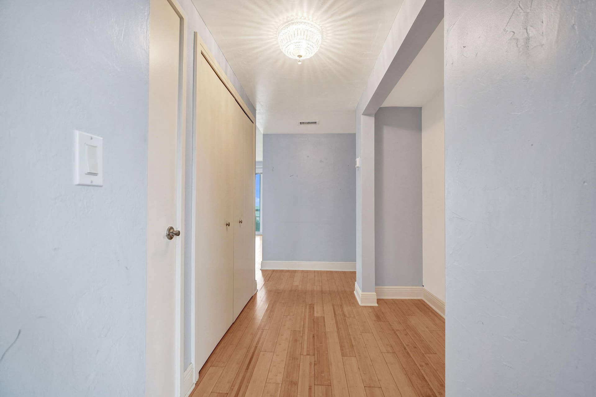 FACING ENTRY HALL INTO UNIT