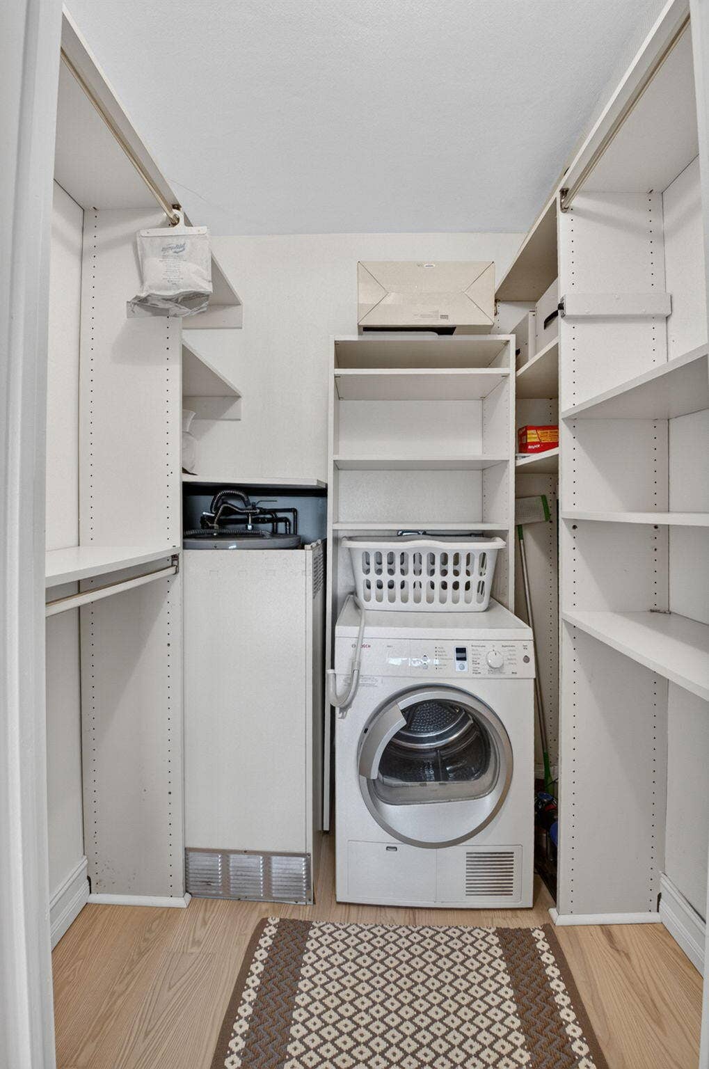 guest room walk incloset with dryer