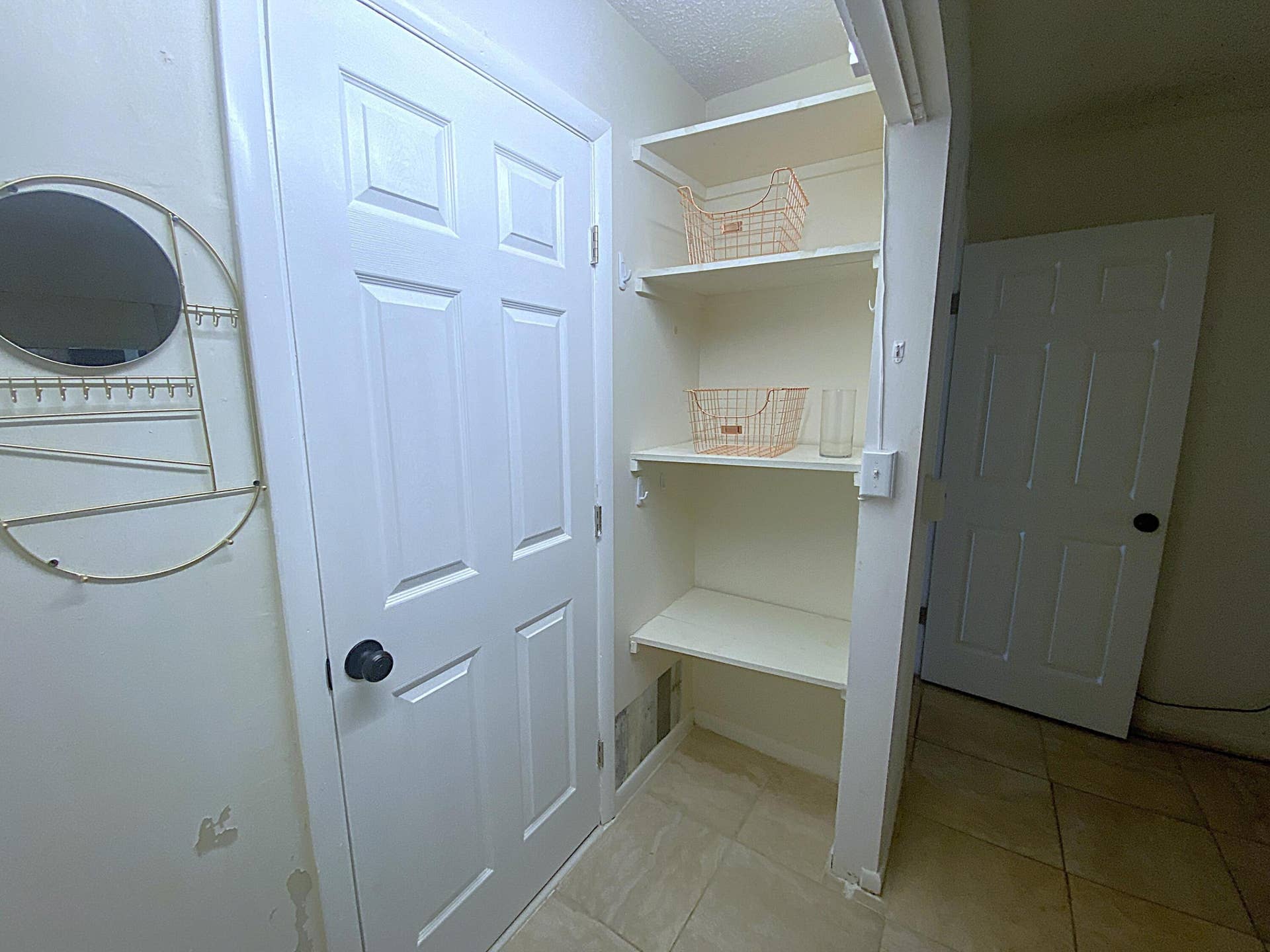 Master BR Closet + Door to Main Bath