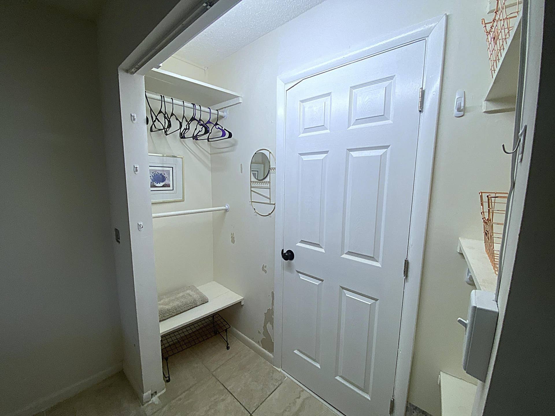 Master BR Closet + Door to Main Bath