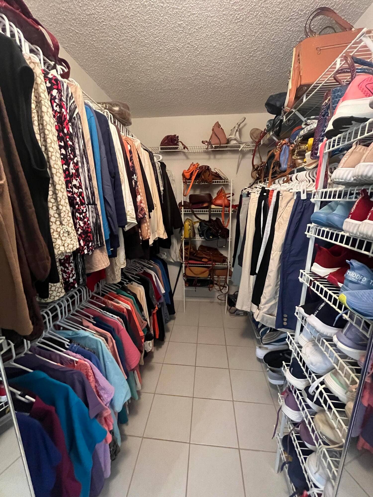 6269 Pointe Regal Circle, #305, Delray Beach, FL 33484 very deep walk-in closet in the primary bedroom