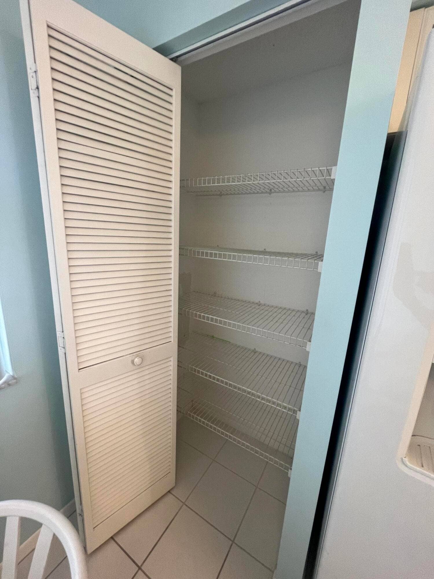 6269 Pointe Regal Circle, #305, Delray Beach, FL 33484 located next to the laundry utility closet.