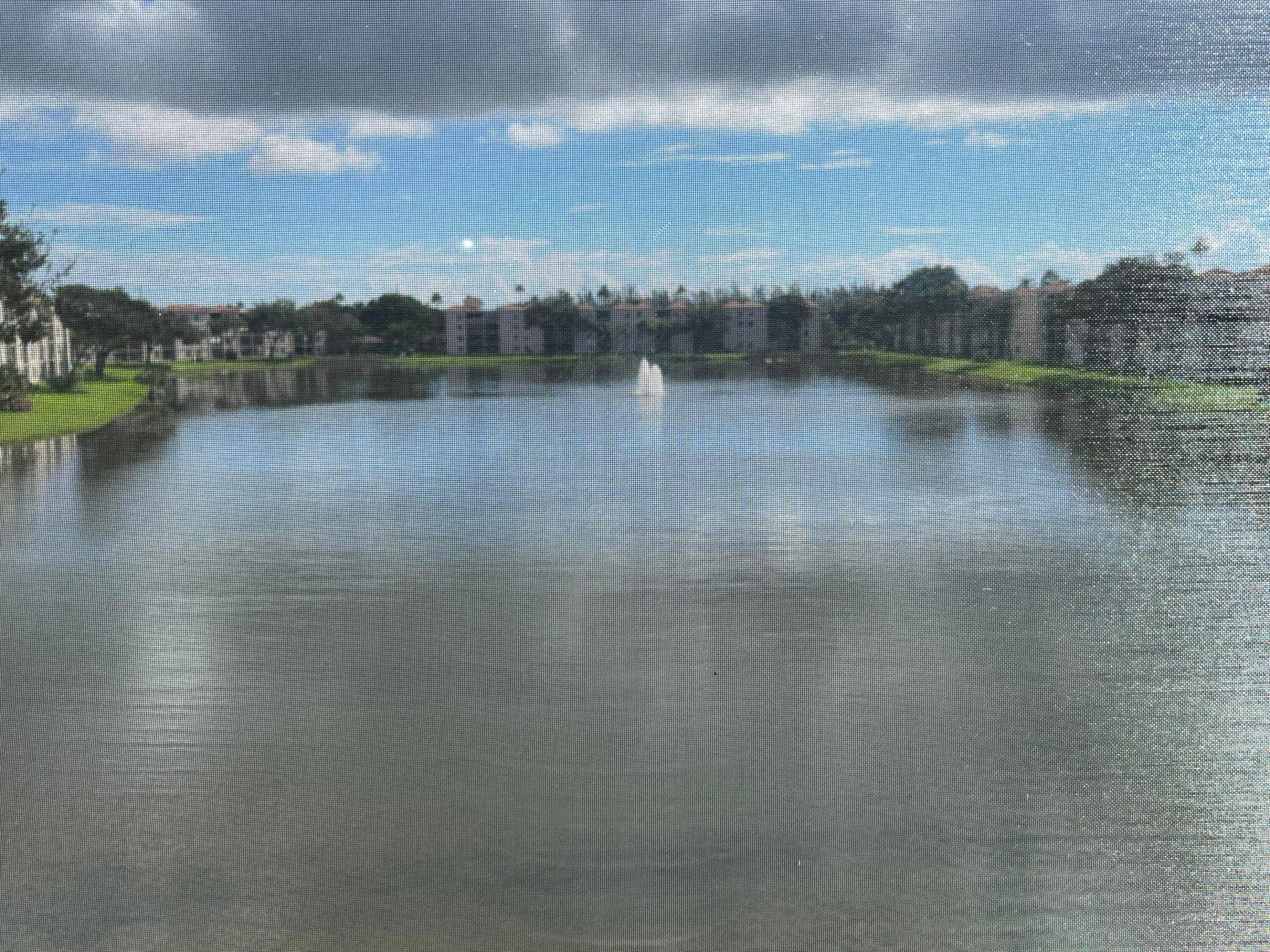 6269 Pointe Regal Circle, #305, Delray Beach, FL 33484 longest lake view from your third floor patio.