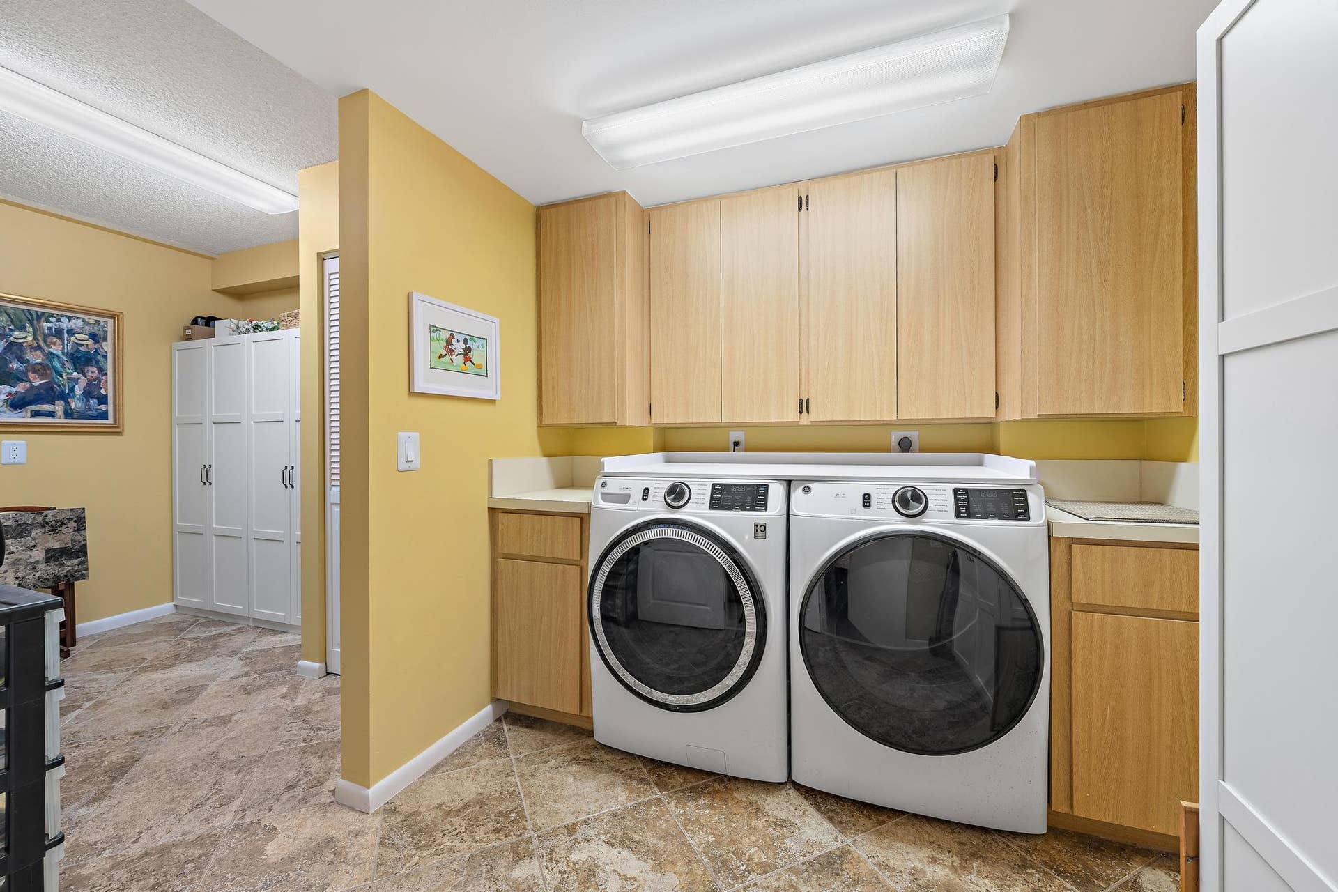 Laundry room with storage