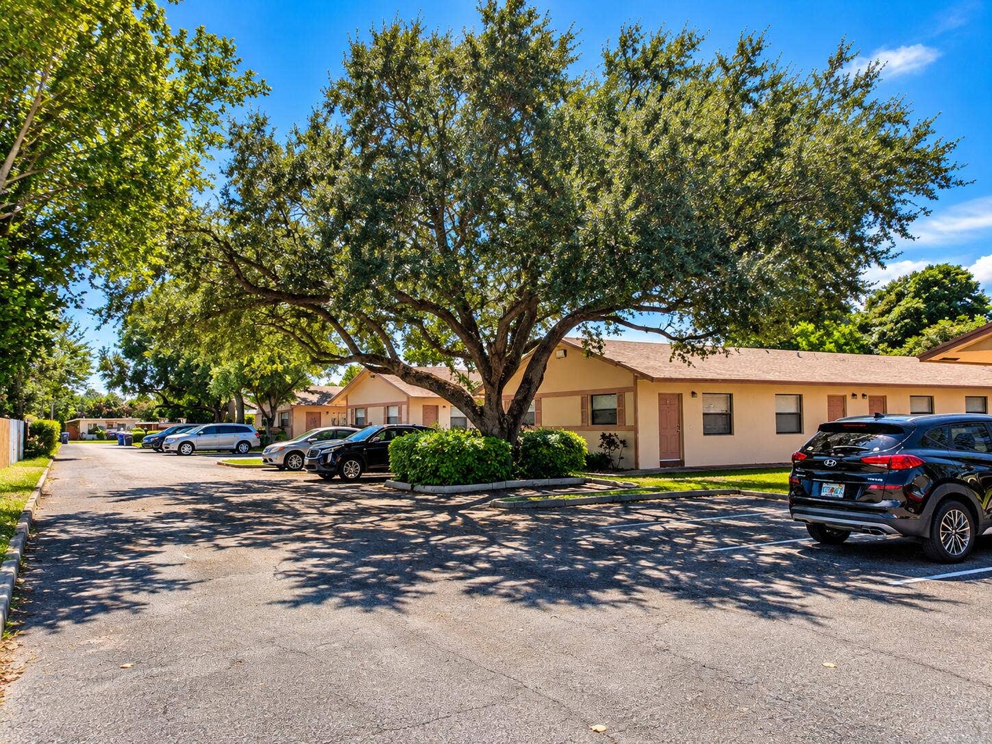 5619 Mckinley, #A-H, Hollywood, FL 33021 Sunny Apartment Courtyard Beneath a Spra