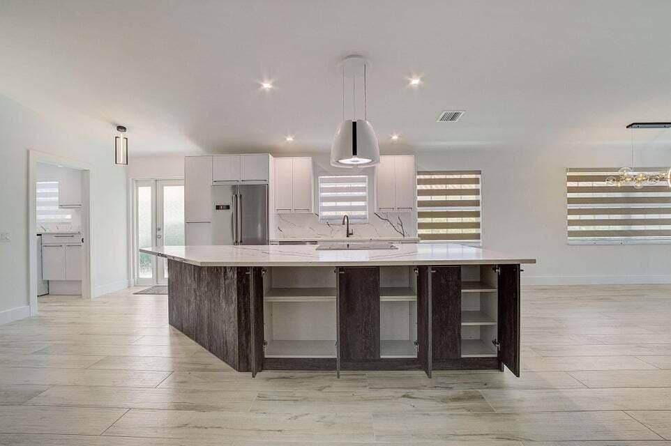 2802 Livingston Lane, West Palm Beach, FL 33411 KITCHEN WITH EXTRA STORAGE