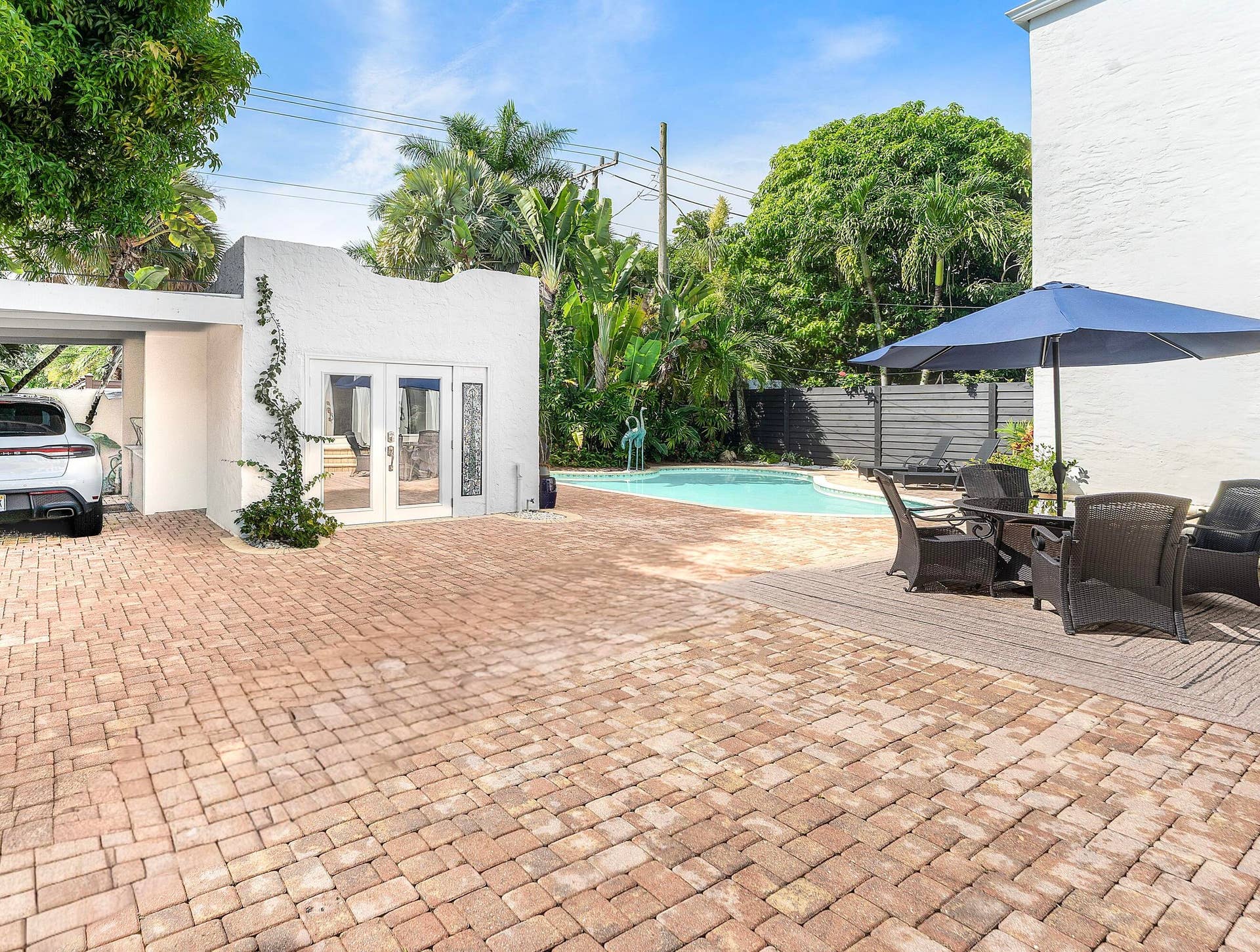 Side driveway, and parking area.