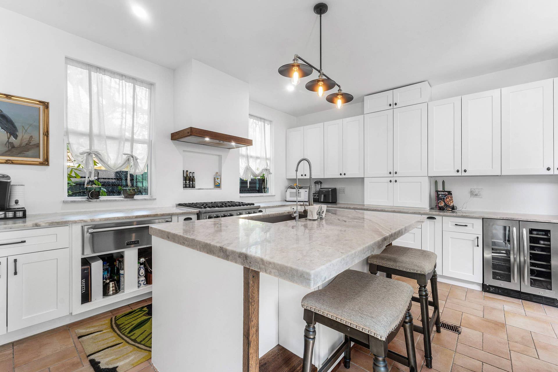 Viking gas range, and warming drawer. Bosch refrigerator, and dishwasher.