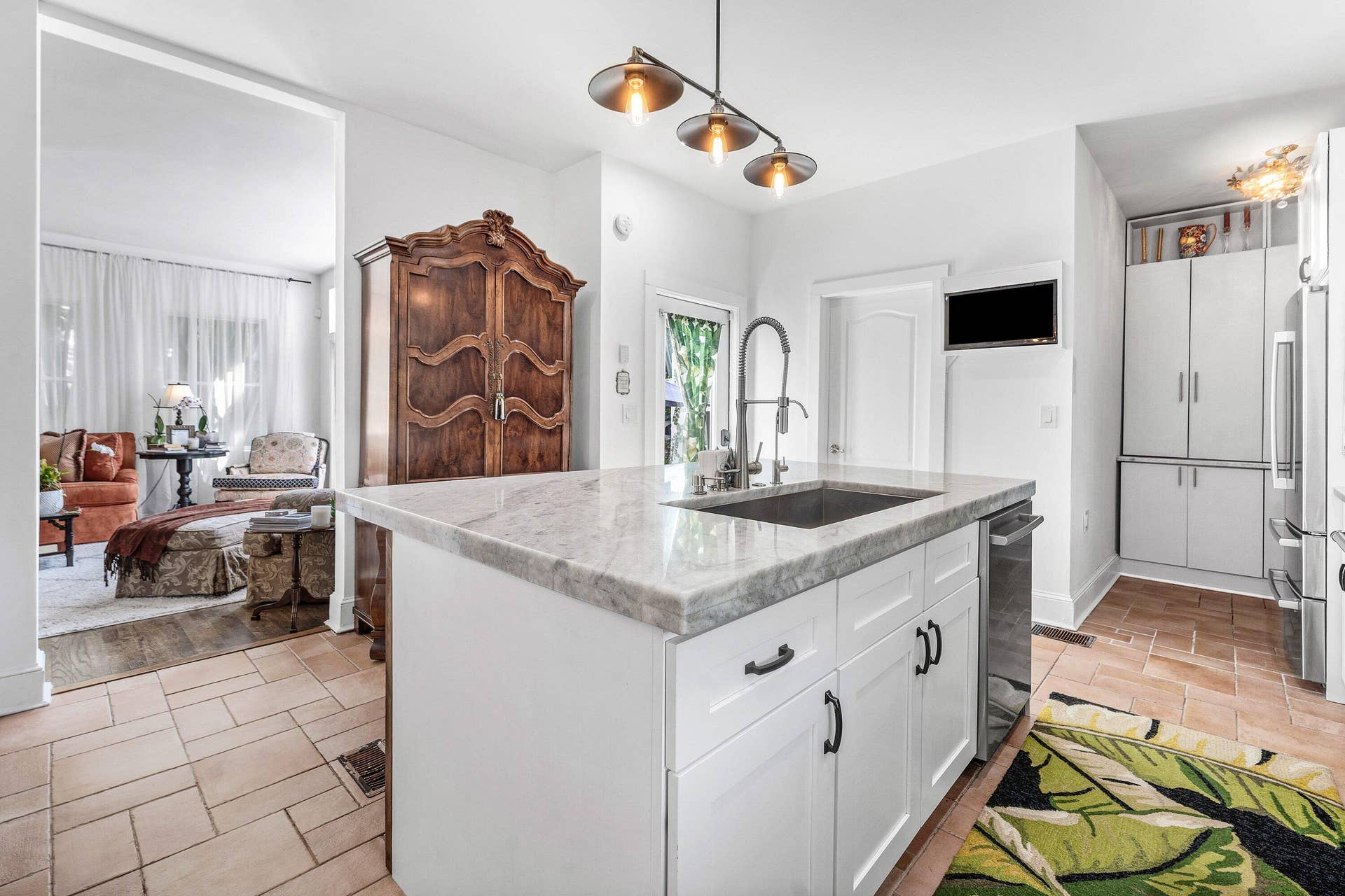Kitchen addition, pantry, and full bath.