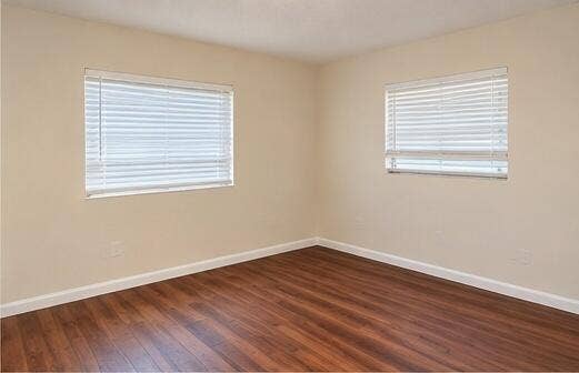227 CASTLEWOOD Drive, #207, North Palm Beach, FL 33408 03_bedroom_two_windows