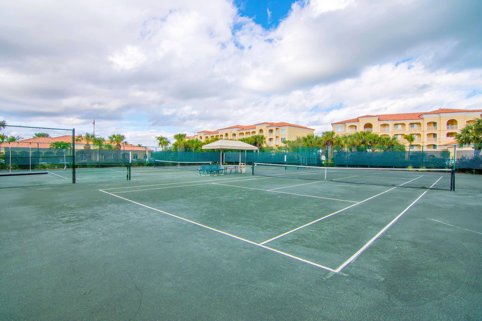 Two well-maintained clay tennis courts