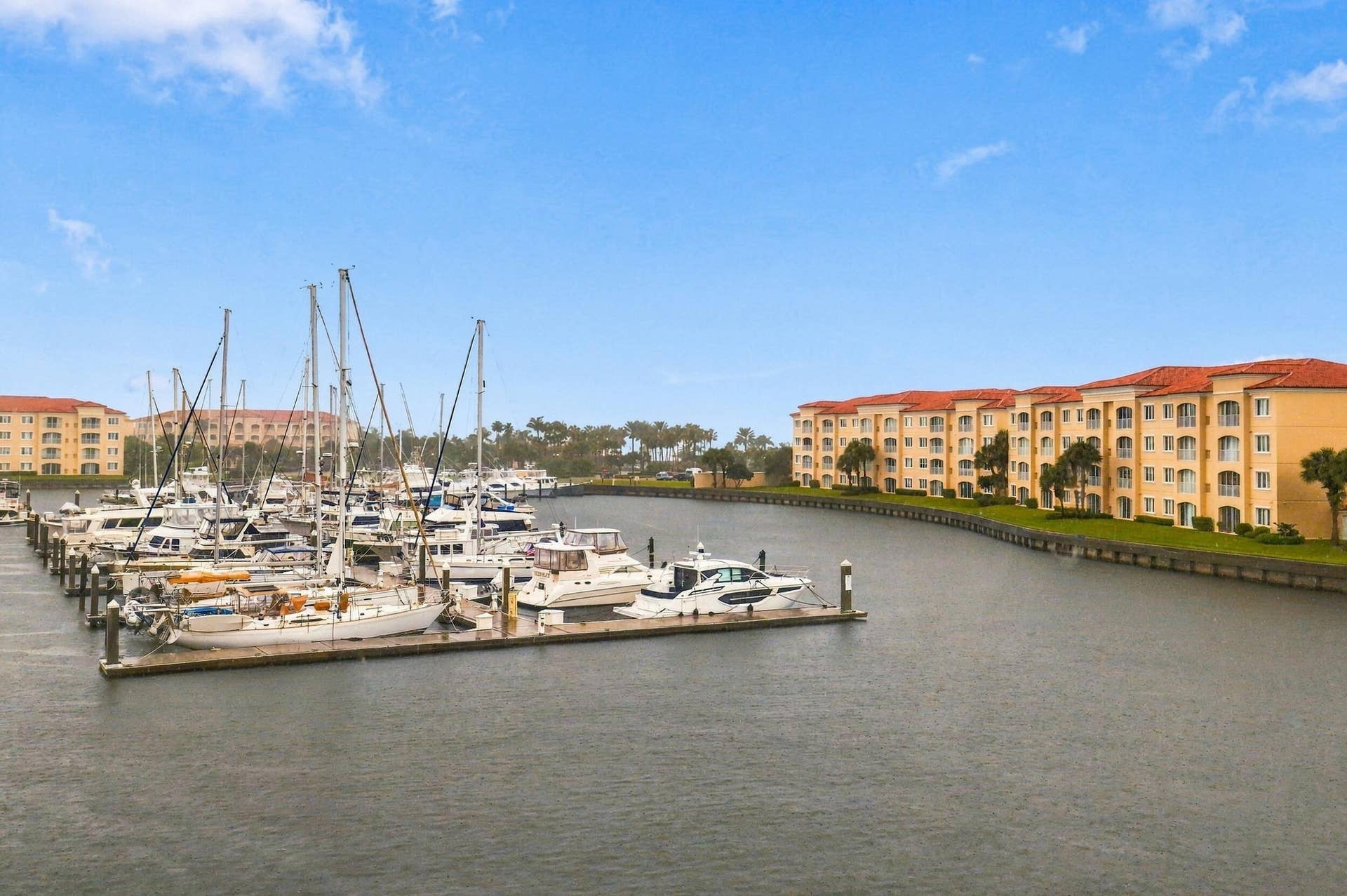 Wide marina view. You won't believe the sea life you'll see from this home along with all the yachts coming and going from the marina.