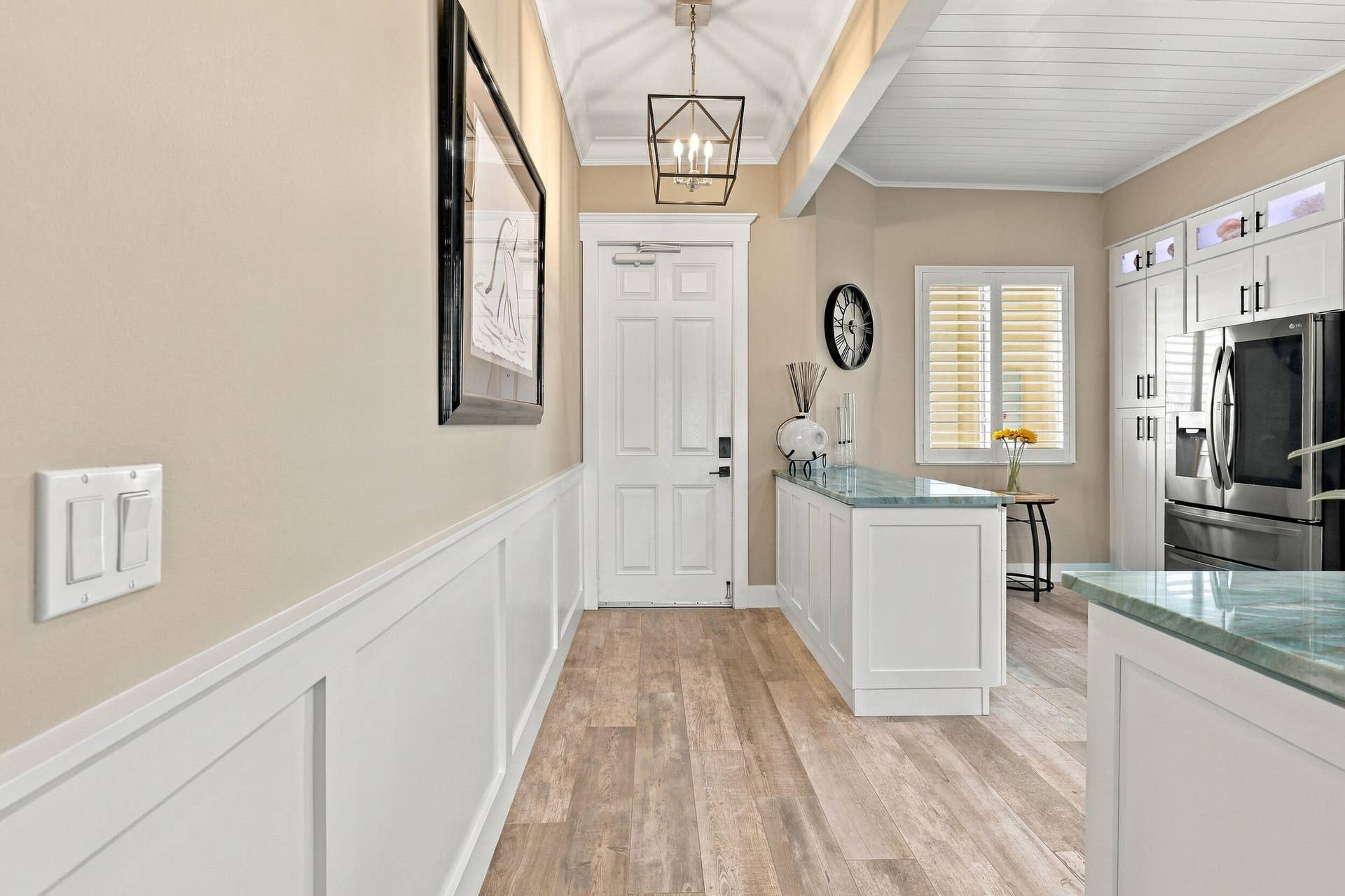 Beautiful 4 x 8 Wood Tone Tile with 34 Different Designs is throughout the home. Also, all press-board trim/molding has been replaced with solid wood.