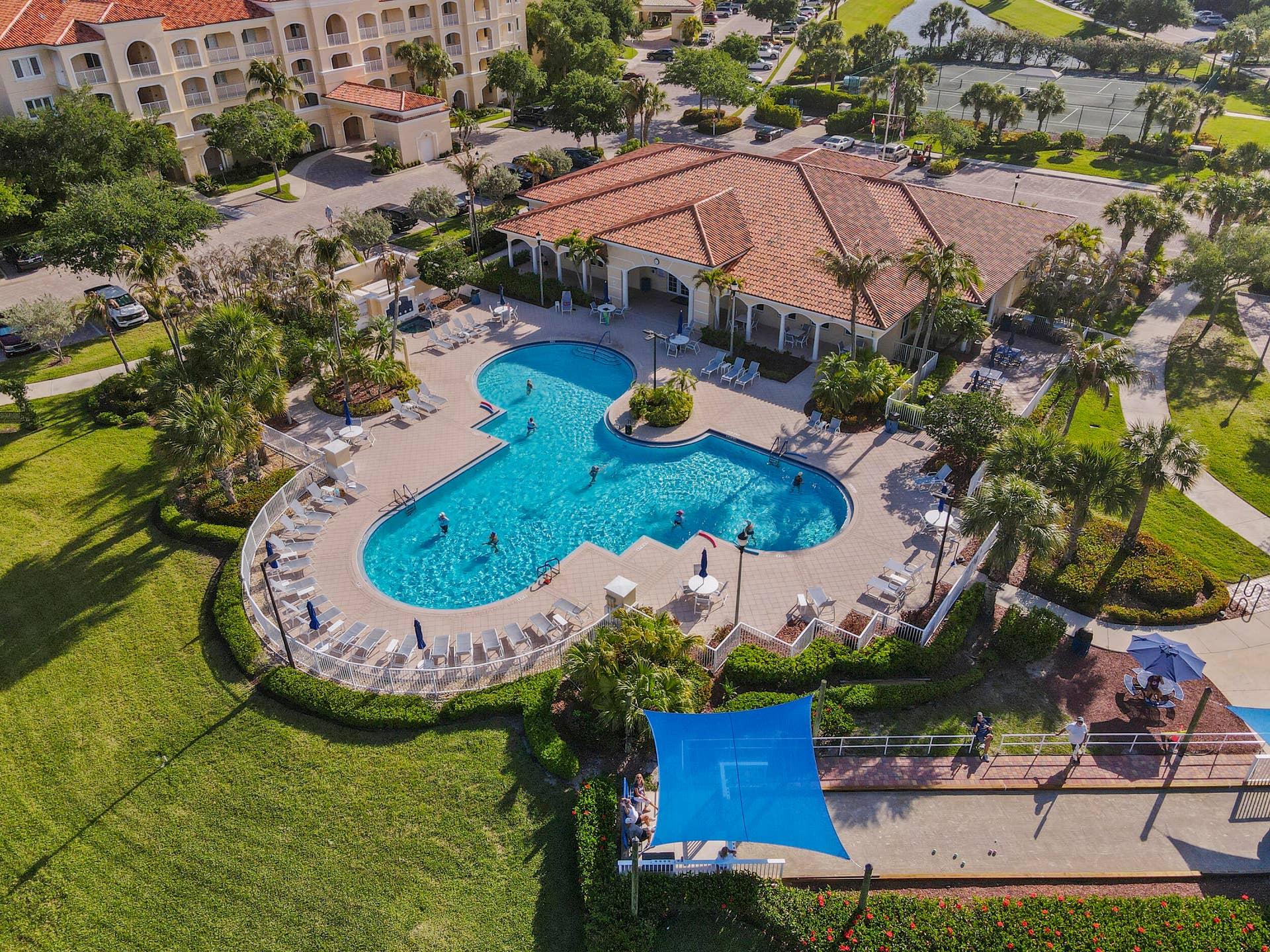Amenities include swimming, bocce, gym, clubhouse, walking paths, 24-hour security guard at gate, dog park, and more. Pet friendly community!