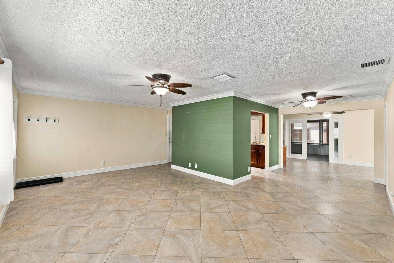 1707 SW 18th Street, Boynton Beach, FL 33426 Living room with L shaped breakfast area or additional living space