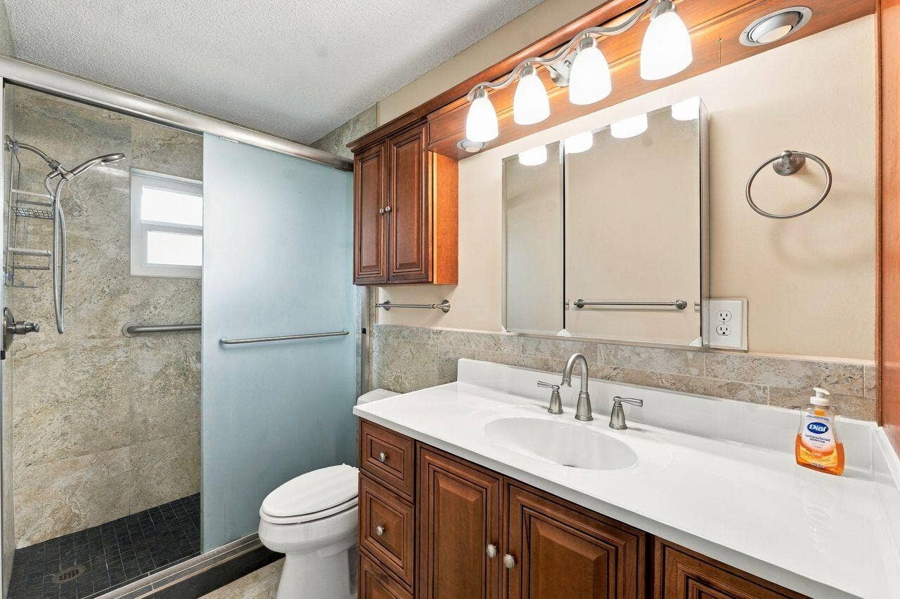 1707 SW 18th Street, Boynton Beach, FL 33426 Custom designed bathroom with lots of storage
