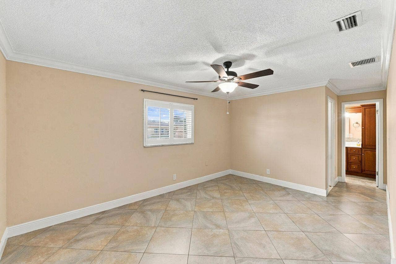 1707 SW 18th Street, Boynton Beach, FL 33426 Light and bright with lovely neutral tile on the diagonal