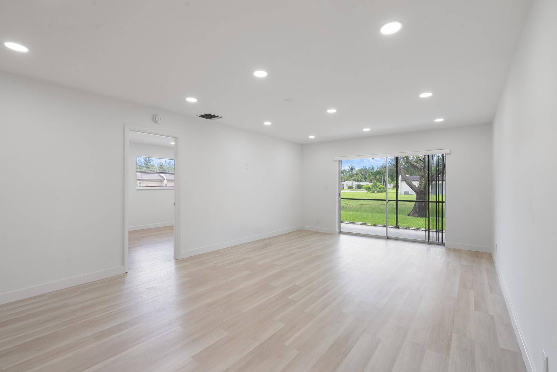 Living Room to Enclosed Patio