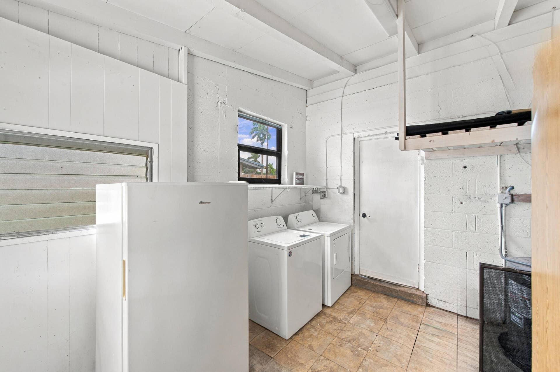 2536 GULFSTREAM Lane, Fort Lauderdale, FL 33312 Tile flooring and white exposed beam ceiling