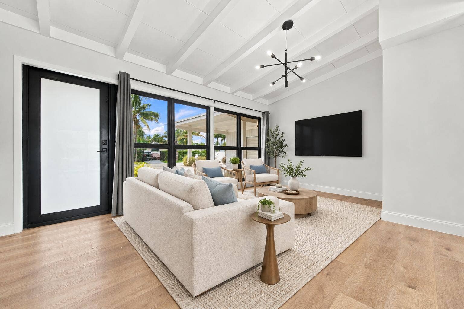 2536 GULFSTREAM Lane, Fort Lauderdale, FL 33312 Wood-finish flooring throughout, complemented by a coffered ceiling